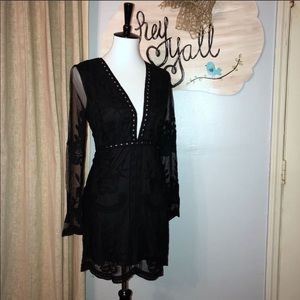 Long sleeved black lace mini dress